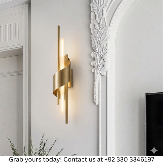 GOLDEN TWIST GLOW WALL LIGHT